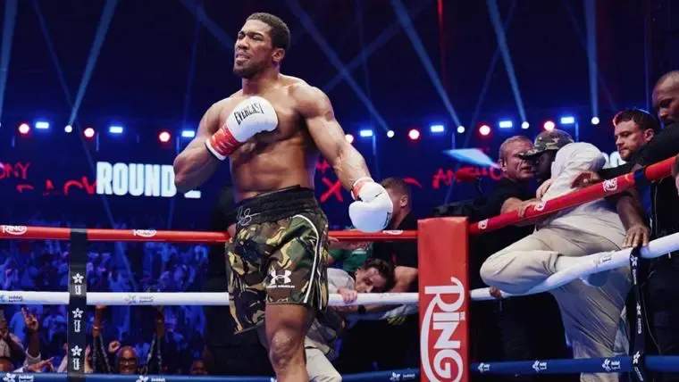 Anthony Joshua walking to a neutral corner during the fight against Kristian Prenga